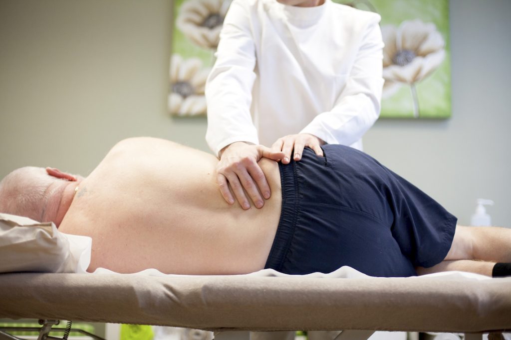 Enfield osteopath treating back pain